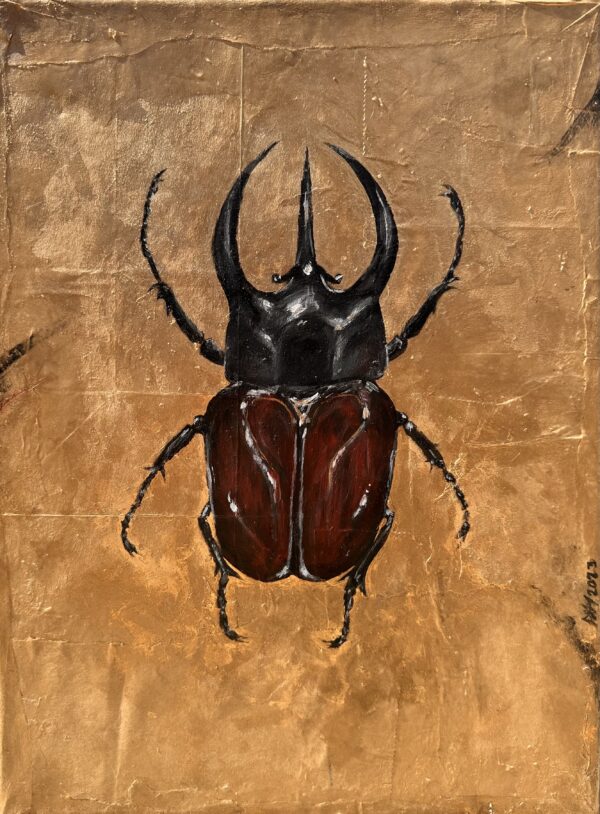 Red and black beetle on gold background