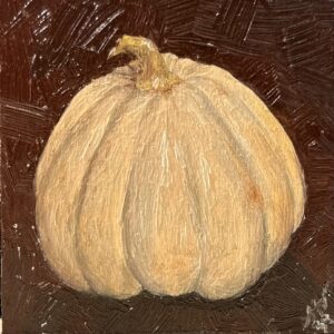 White gourd/pumpkin on umber background