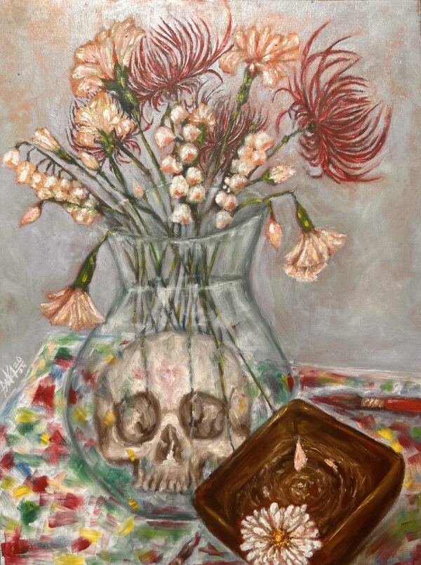 Momento mori vase with a skull and flowers on it on a table covers in paint